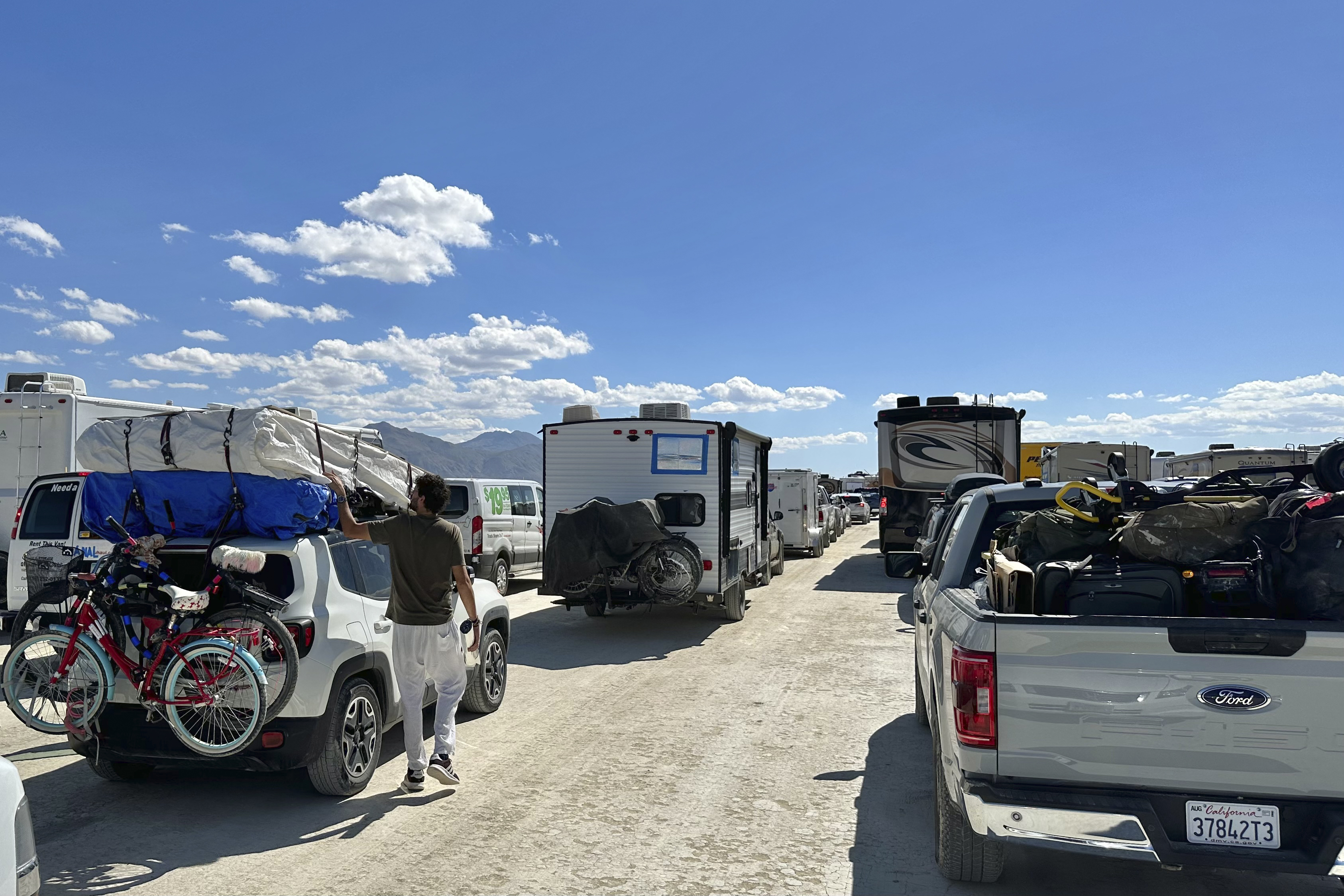 No longer stranded, tens of thousands clean up and head home after Burning Man floods - Vimarsana News